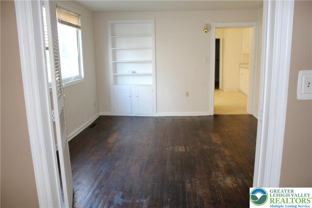 610 West Garrison Street, Unit 1 Bethlehem, PA 18018 - Photo 10 of 15 a view of a small space with wooden floor and a window