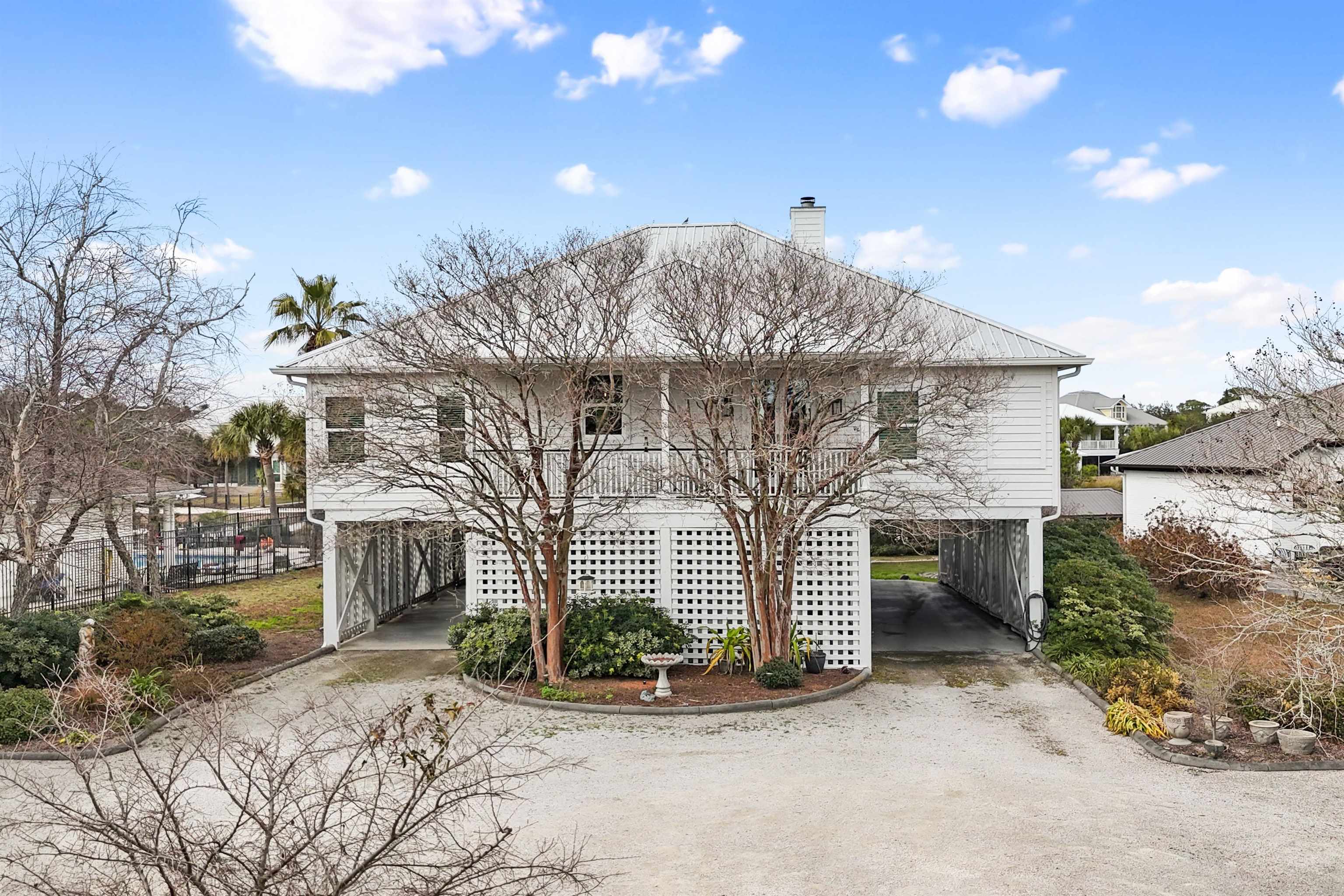 31835 River Road Orange Beach, AL 36561 - Photo 1 of 55 Front Of Structure