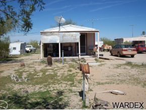44127 East Ocotillo Bouse, AZ 85325 - Photo 1 of 4 a view of a house with a patio