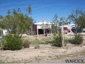 44127 East Ocotillo Bouse, AZ 85325 - Photo 2 of 4 a front view of a house with a yard