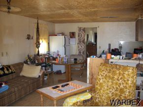 44127 East Ocotillo Bouse, AZ 85325 - Photo 4 of 4 a living room with furniture and a table