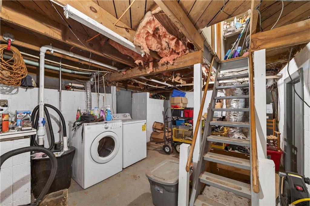 4399 Highway 411 Rydal, GA 30171 - Photo 18 of 37 a utility room with dryer washer and other items