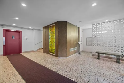 a view of an empty room with a gallery