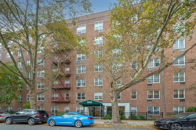 a cars parked in front of a building