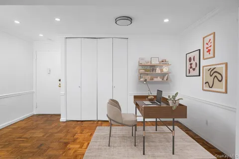 a workspace with furniture and rug