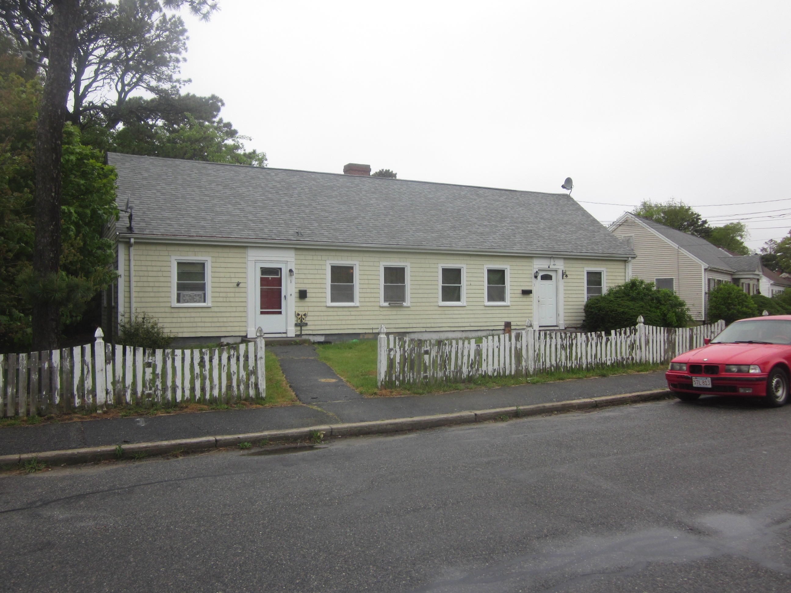 1 Fresh Holes Road Barnstable, MA 02601 - Photo 1 of 1 a front view of a house with a garden