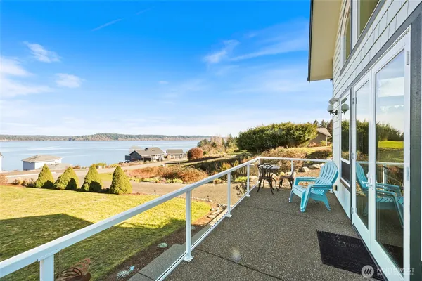 a view of swimming pool with seating area