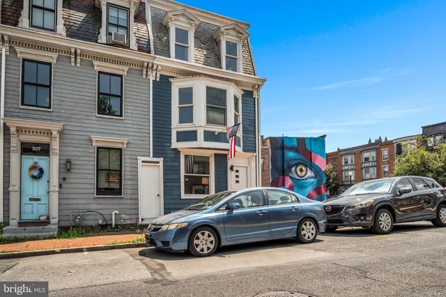 a car parked in front of a building