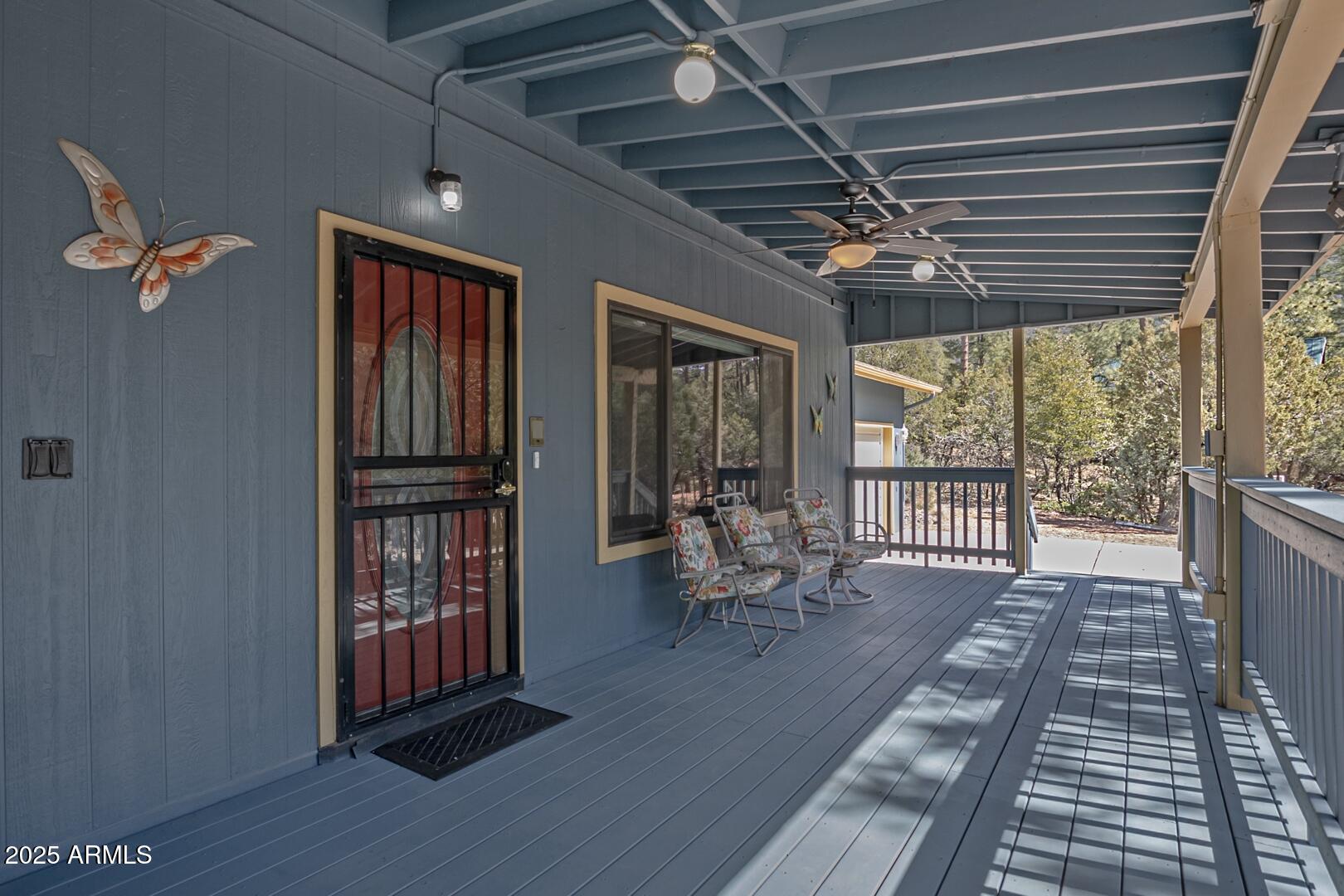 5776 West Sundance Circle Pine, AZ 85544 - Photo 3 of 35 a balcony with furniture