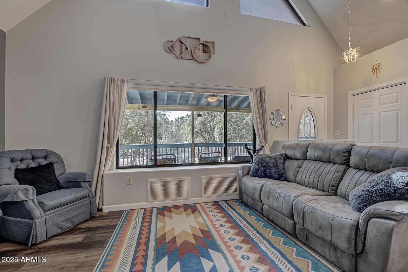5776 West Sundance Circle Pine, AZ 85544 - Photo 6 of 35 a living room with furniture and a large window