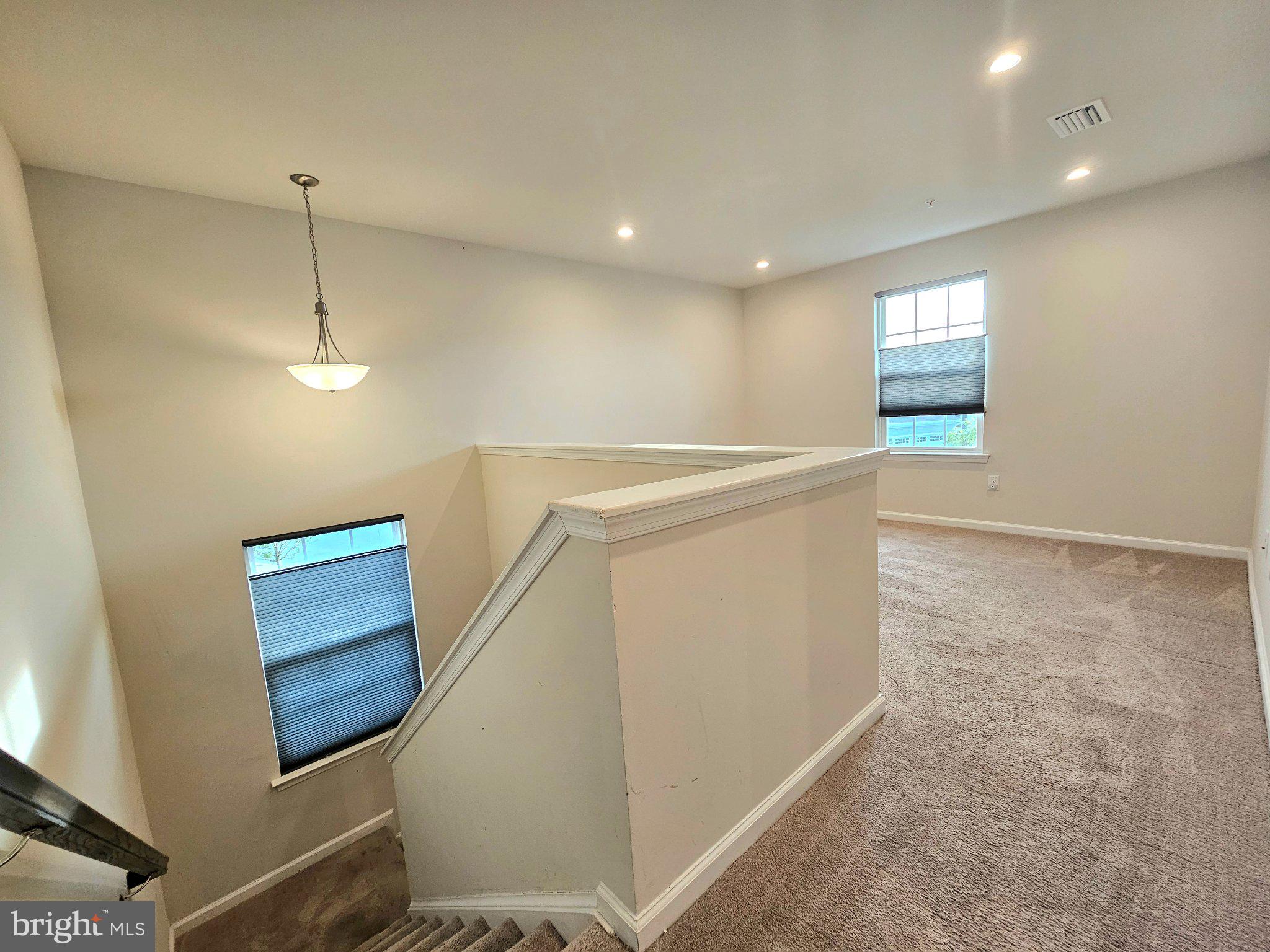 9367 Mulligan Way Delmar, MD 21875 - Photo 16 of 38 Bright and airy upper landing space.