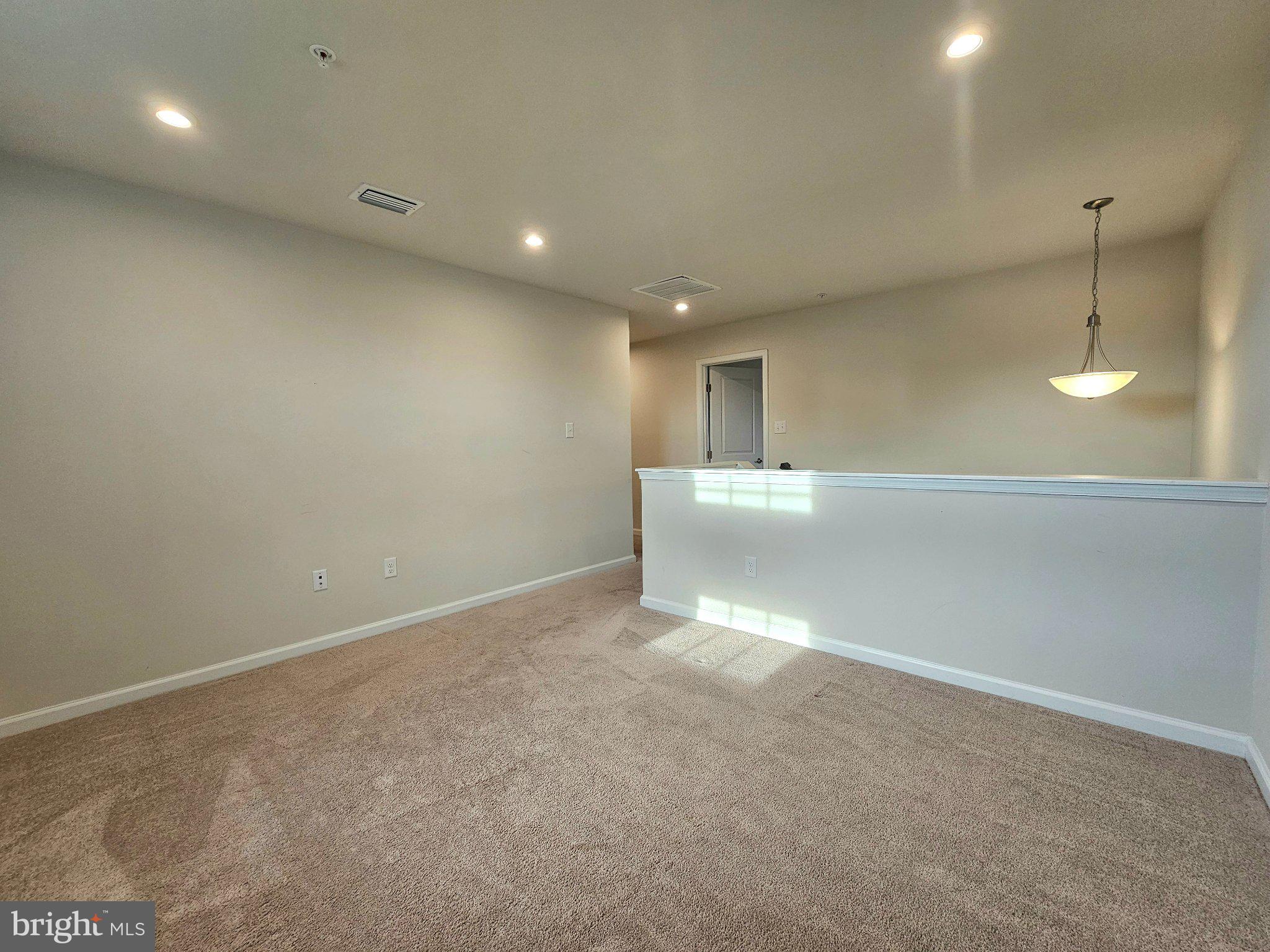 9367 Mulligan Way Delmar, MD 21875 - Photo 18 of 38 Spacious, sunlit living area awaits.