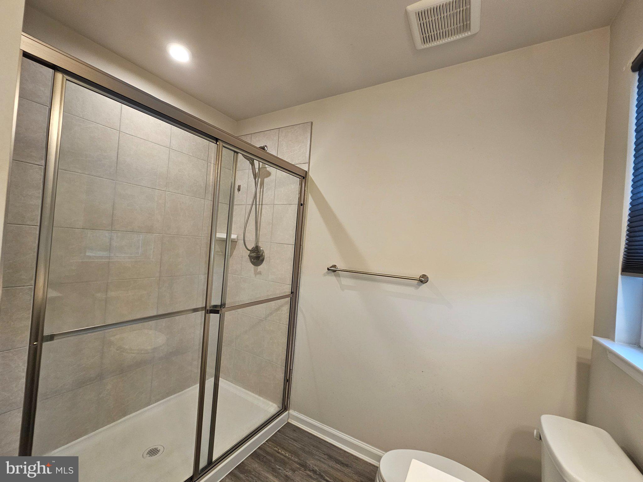 9367 Mulligan Way Delmar, MD 21875 - Photo 22 of 38 Modern shower with sleek design.