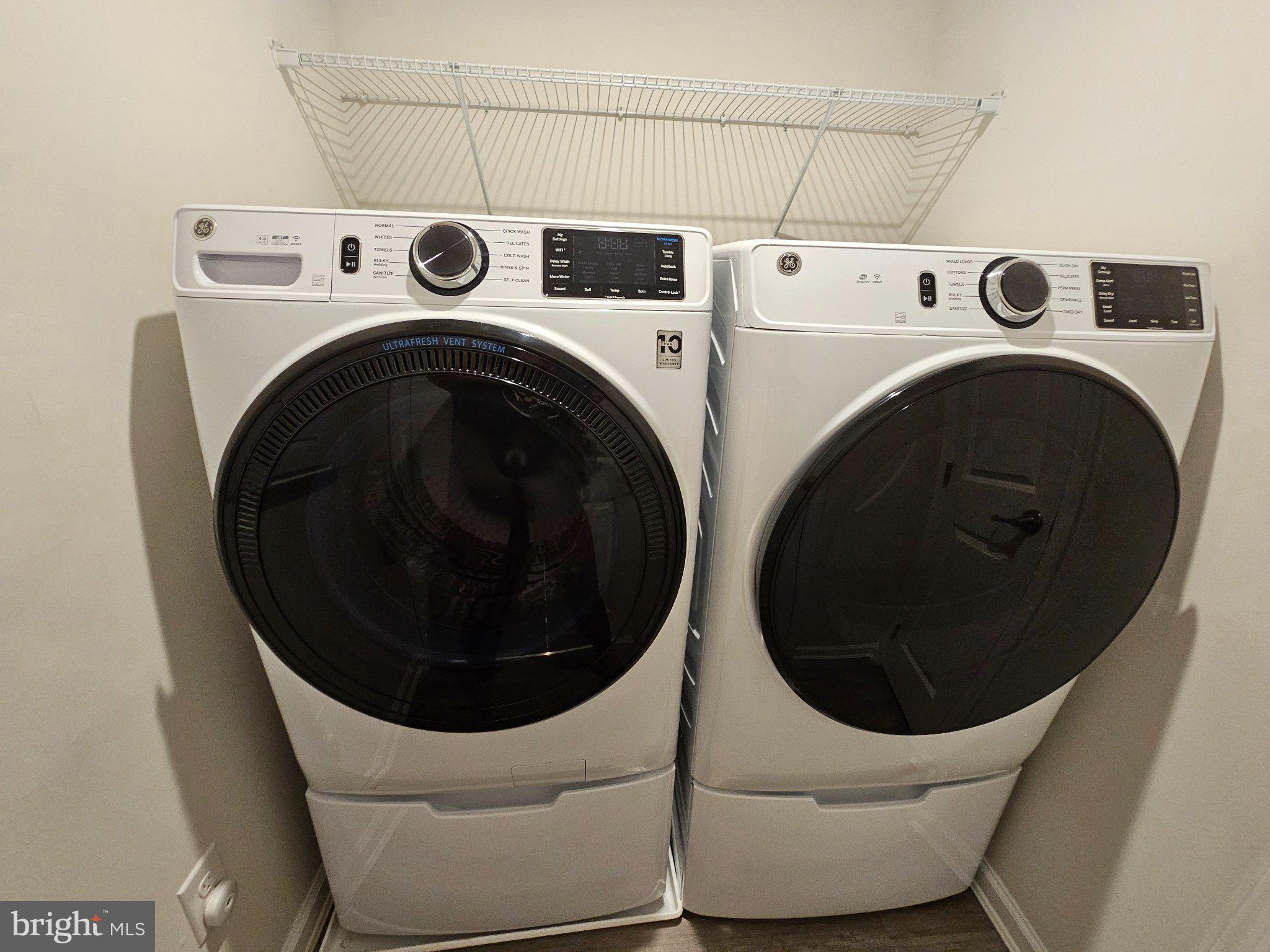 9367 Mulligan Way Delmar, MD 21875 - Photo 29 of 38 Modern laundry duo in sleek design.
