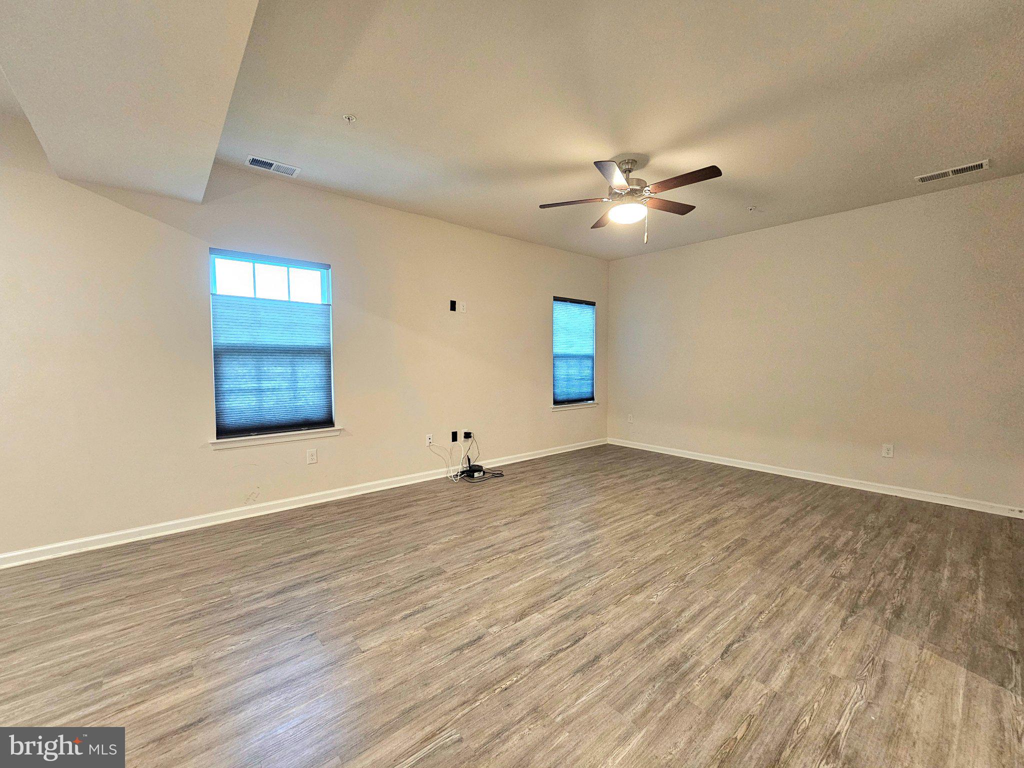 9367 Mulligan Way Delmar, MD 21875 - Photo 4 of 38 Spacious, sunlit living area awaits you.