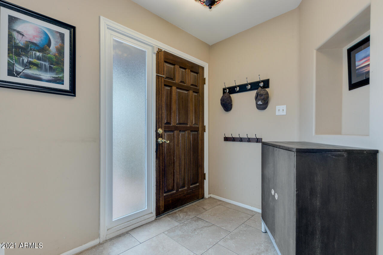 4215 West Dailey Street Phoenix, AZ 85053 - Photo 5 of 32 a view of a hallway with front door