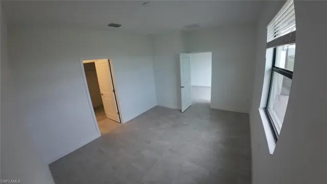 a view of empty room with front door