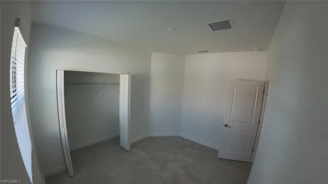 an empty room with closet