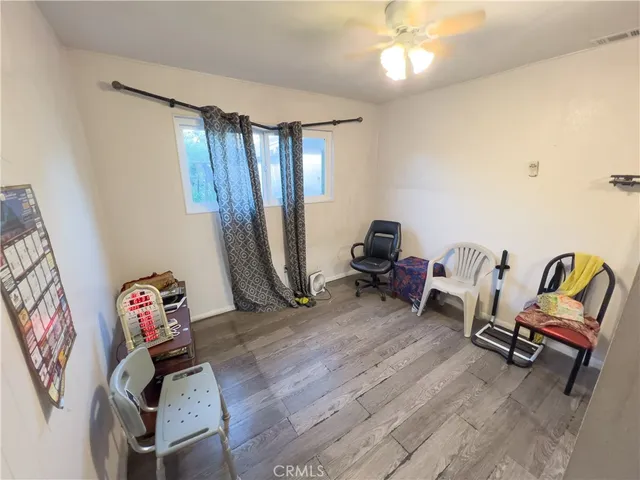 a room with furniture and gym equipment