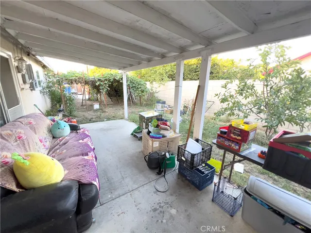 a outdoor living space with furniture and outdoor seating
