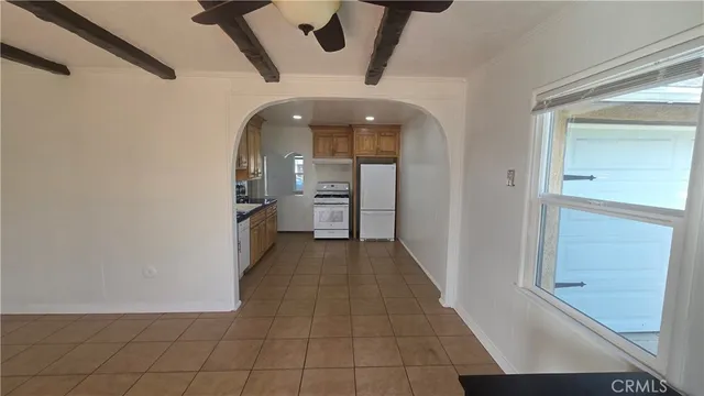 a view of a hallway with a furniture