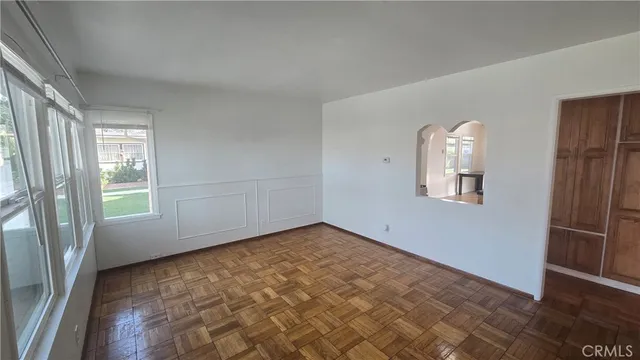 an empty room with windows