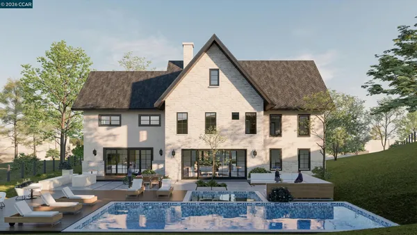 a view of house with yard and outdoor seating