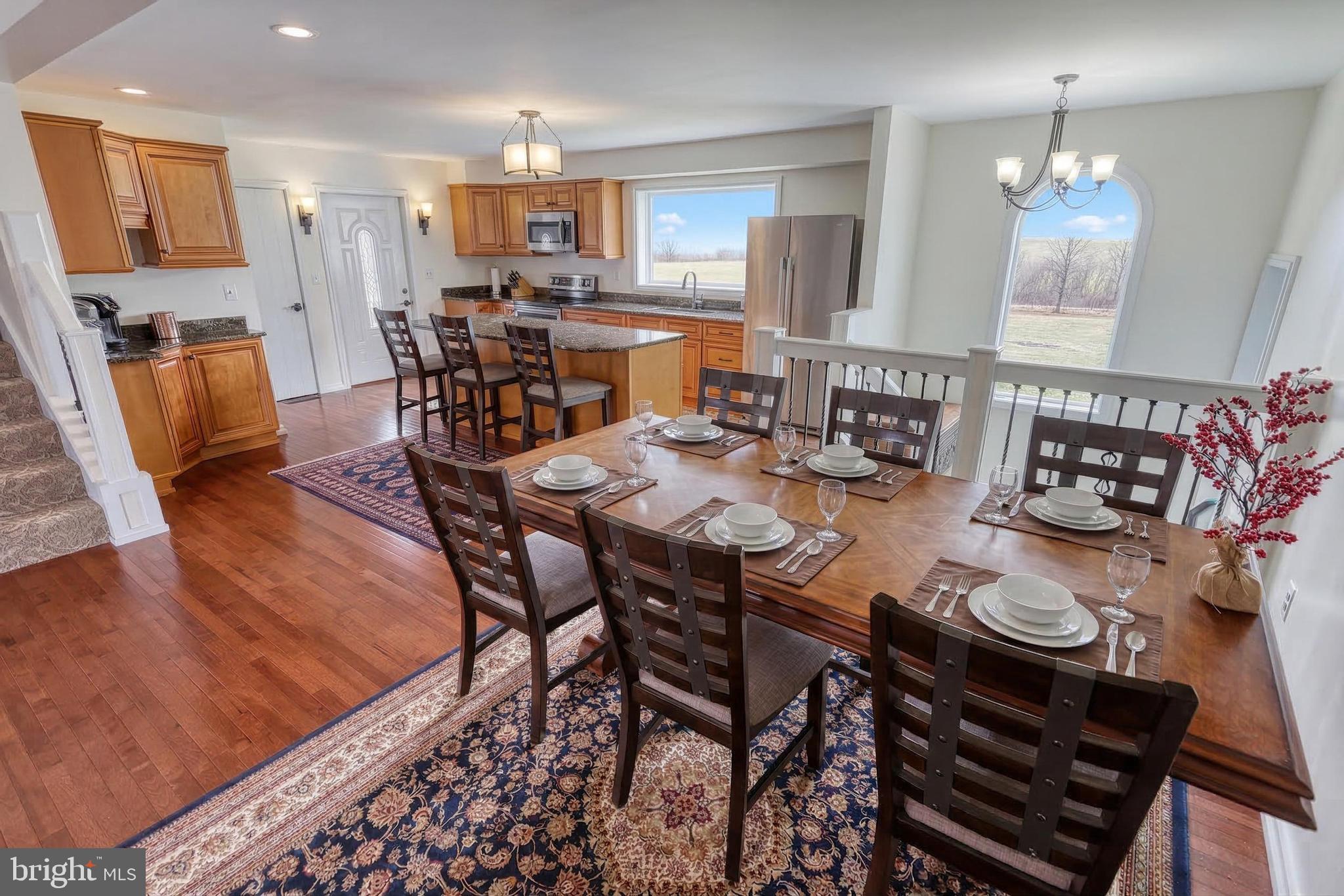 12534 Mt Olivet Road Felton, PA 17322 - Photo 11 of 75 a view of a dining room with furniture and wooden floor