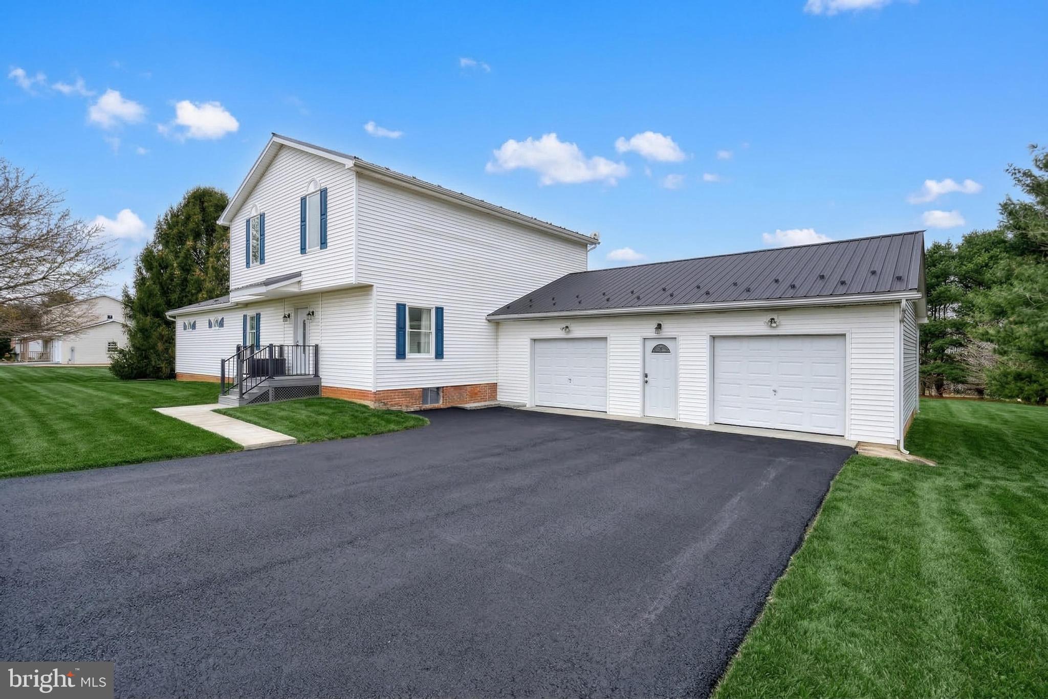 12534 Mt Olivet Road Felton, PA 17322 - Photo 3 of 75 a front view of house with yard and green space