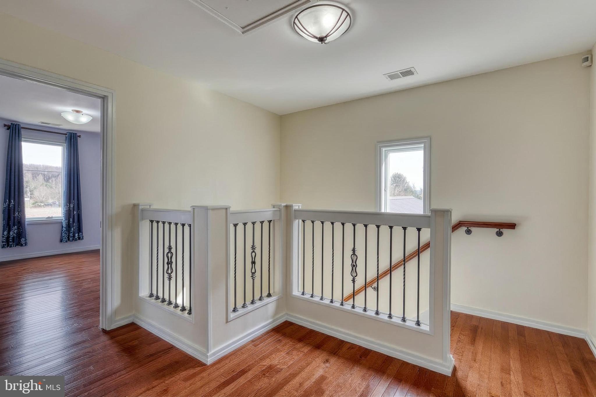 12534 Mt Olivet Road Felton, PA 17322 - Photo 39 of 75 a view of a room with wooden floor and windows