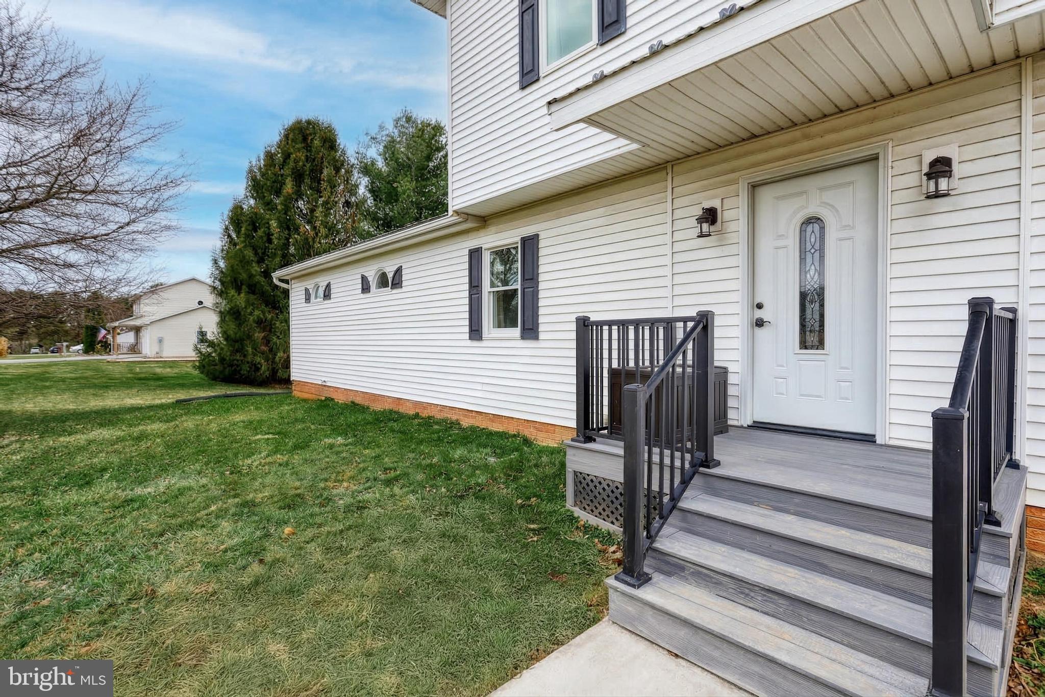12534 Mt Olivet Road Felton, PA 17322 - Photo 5 of 75 a view of a house with backyard and wooden fence