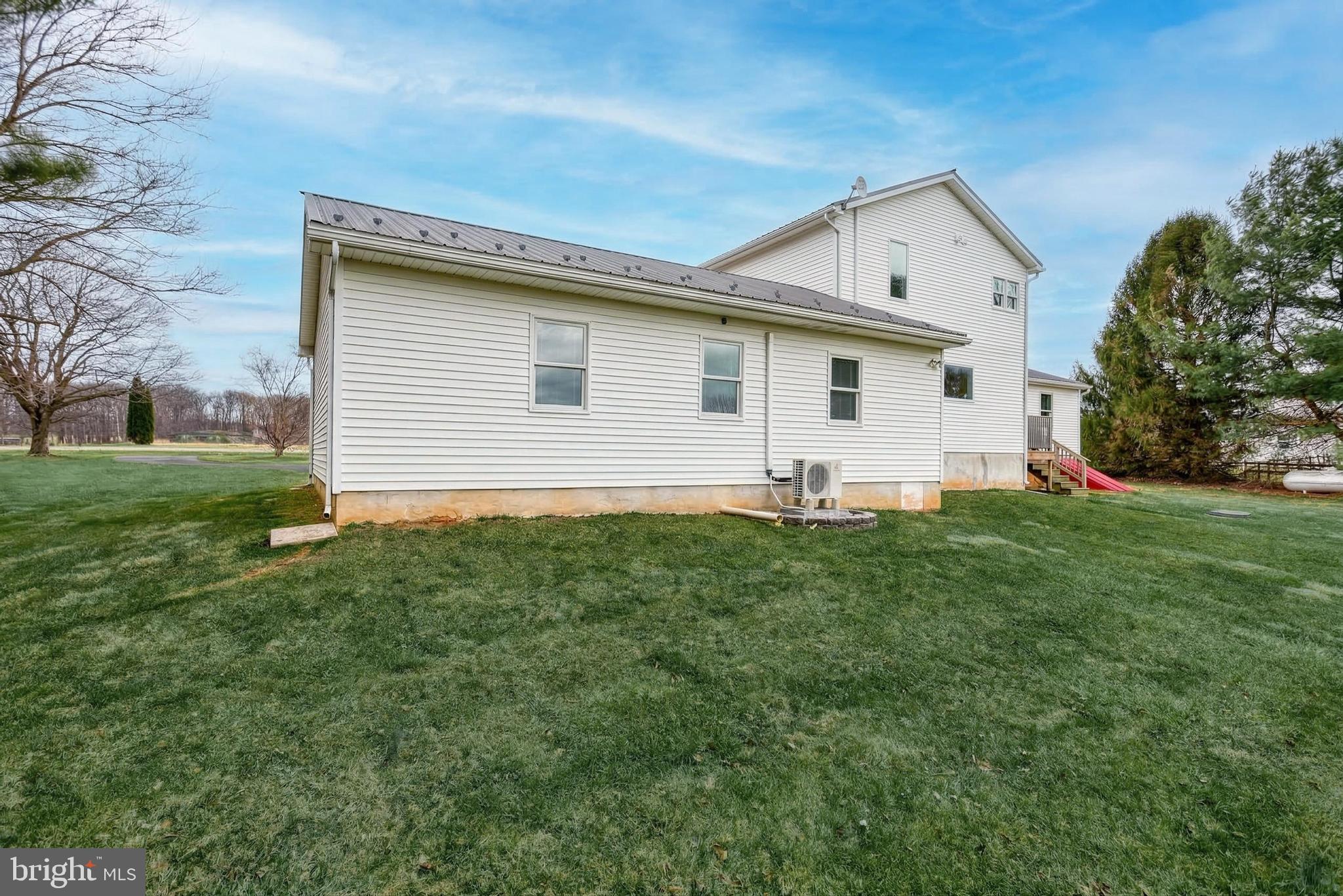 12534 Mt Olivet Road Felton, PA 17322 - Photo 56 of 75 a front view of house with yard and green space
