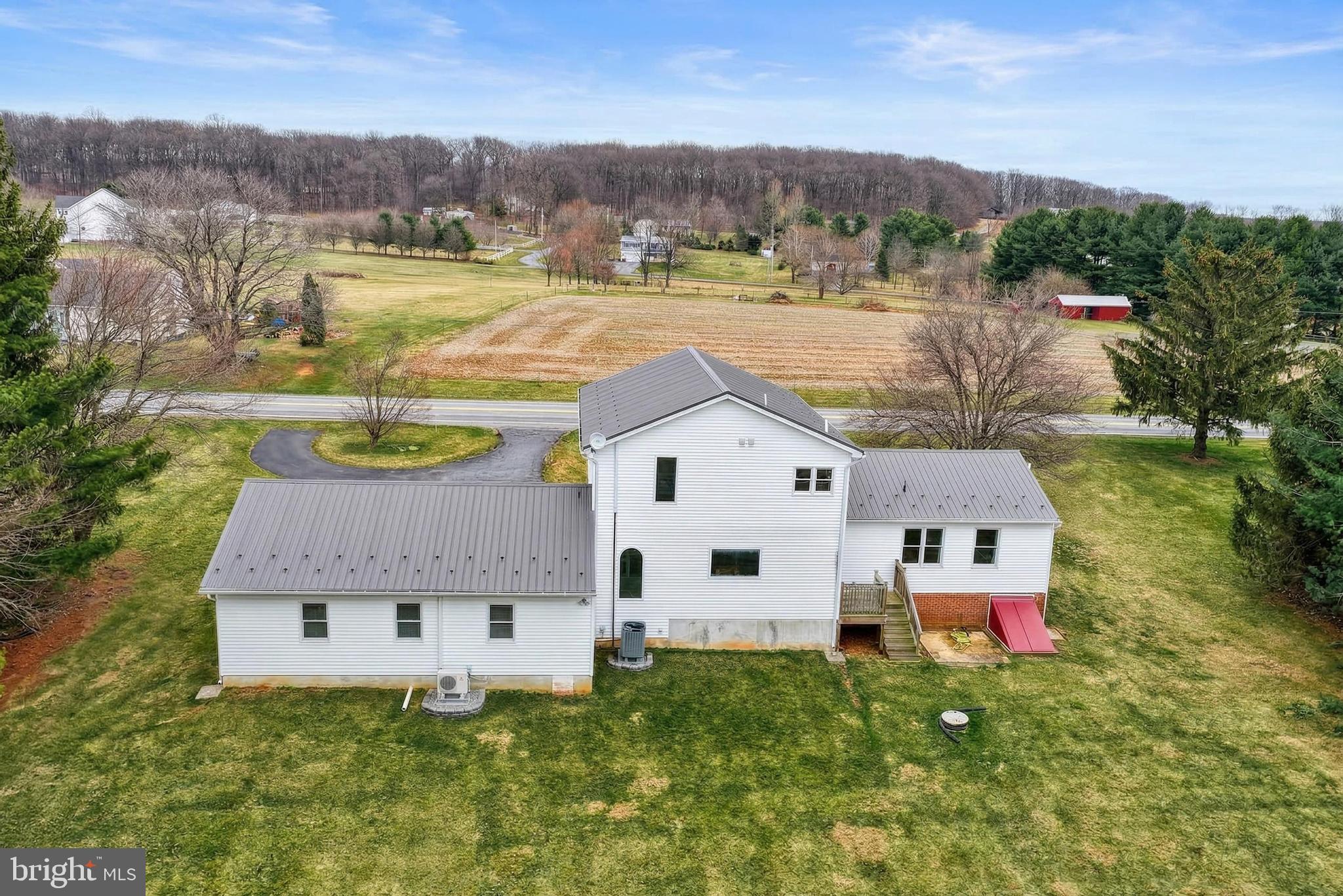 12534 Mt Olivet Road Felton, PA 17322 - Photo 65 of 75 an aerial view of a house with a yard and a large tree