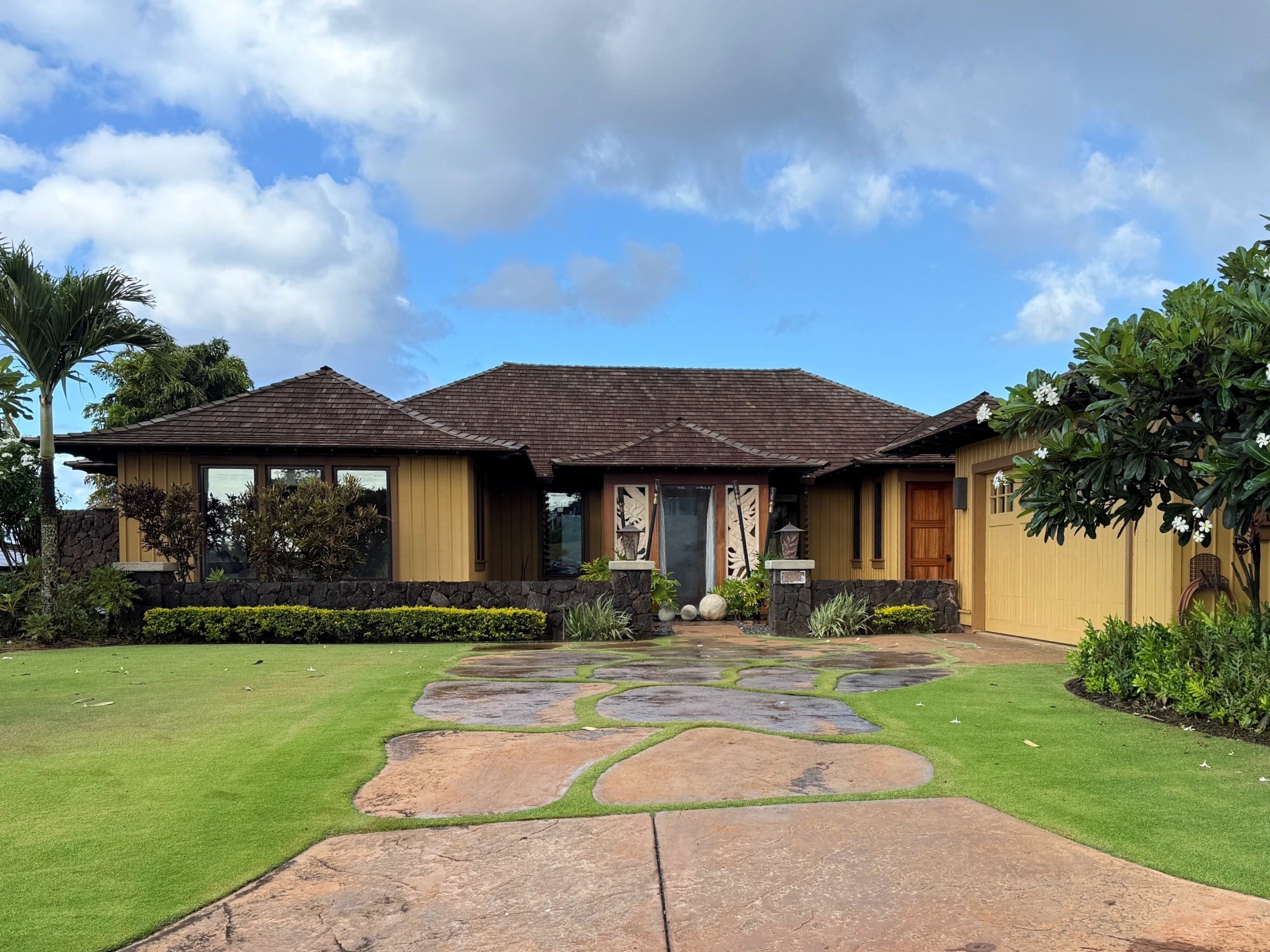 5621 Holo Malanai Street Koloa, HI 96756 - Photo 1 of 1 a front view of a house with garden