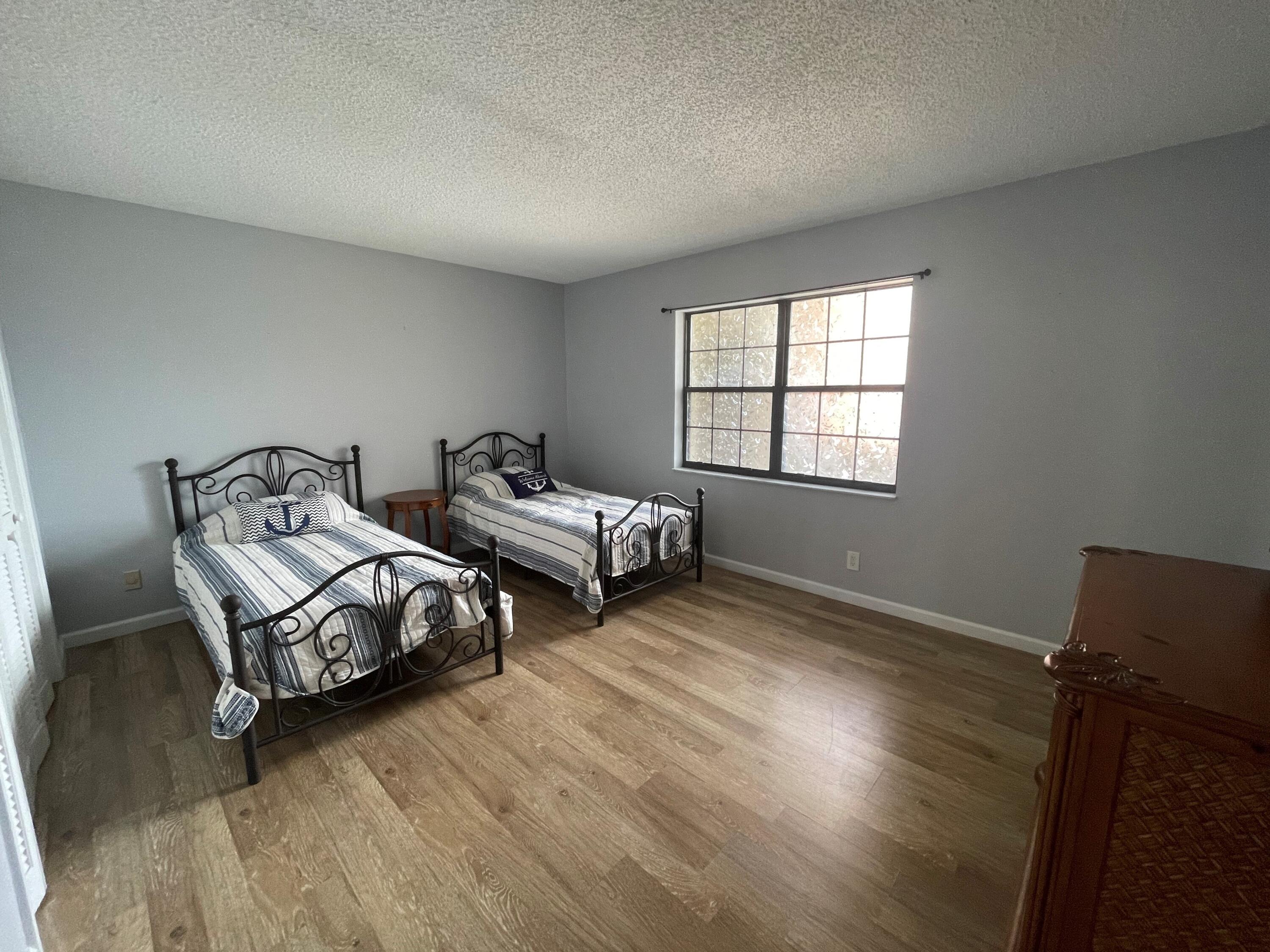 3100 Southeast Pruitt Road, Unit G207 Port St. Lucie, FL 34952 - Photo 11 of 17 Guest Bedroom