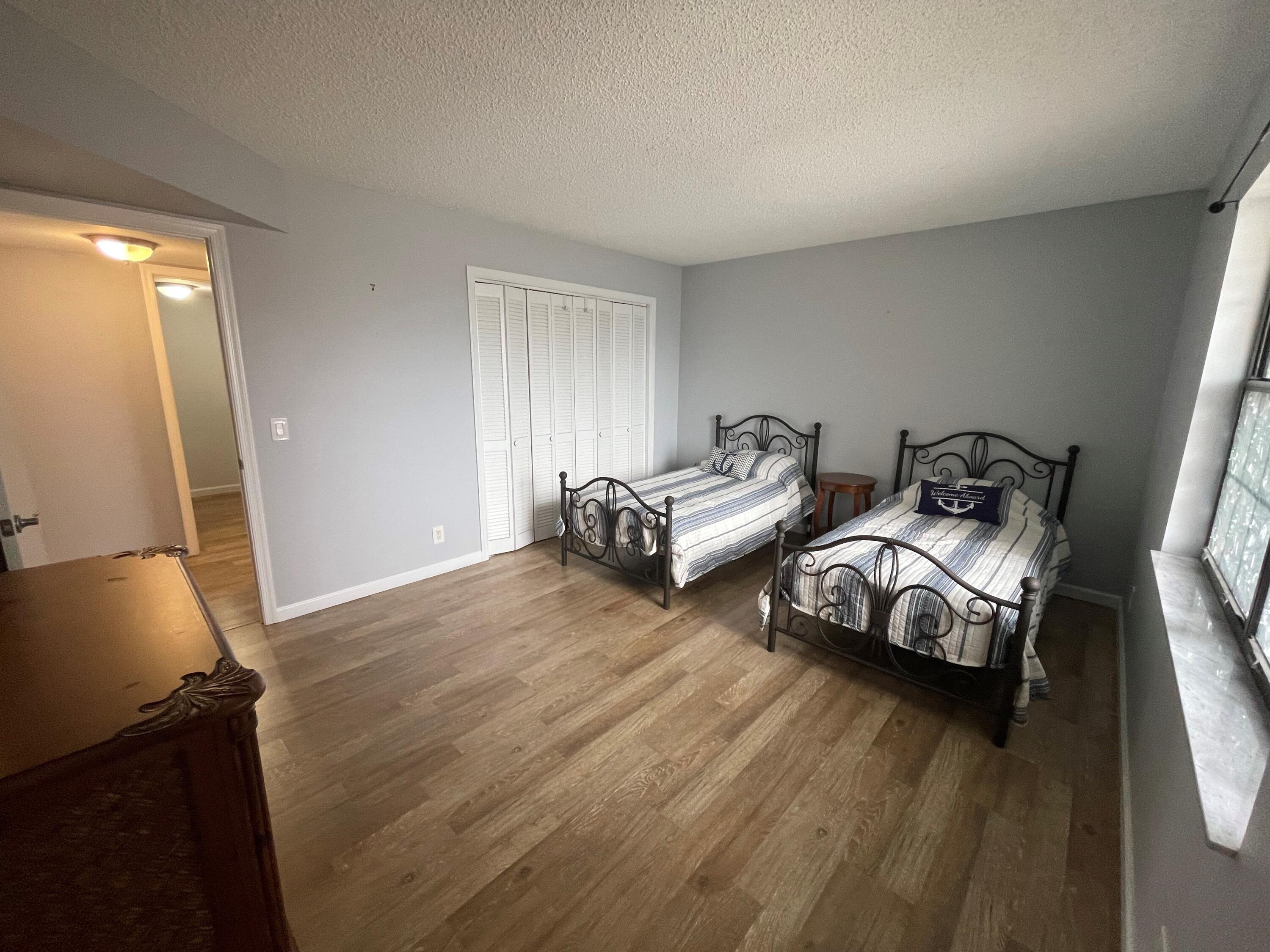 3100 Southeast Pruitt Road, Unit G207 Port St. Lucie, FL 34952 - Photo 12 of 17 Guest Bedroom