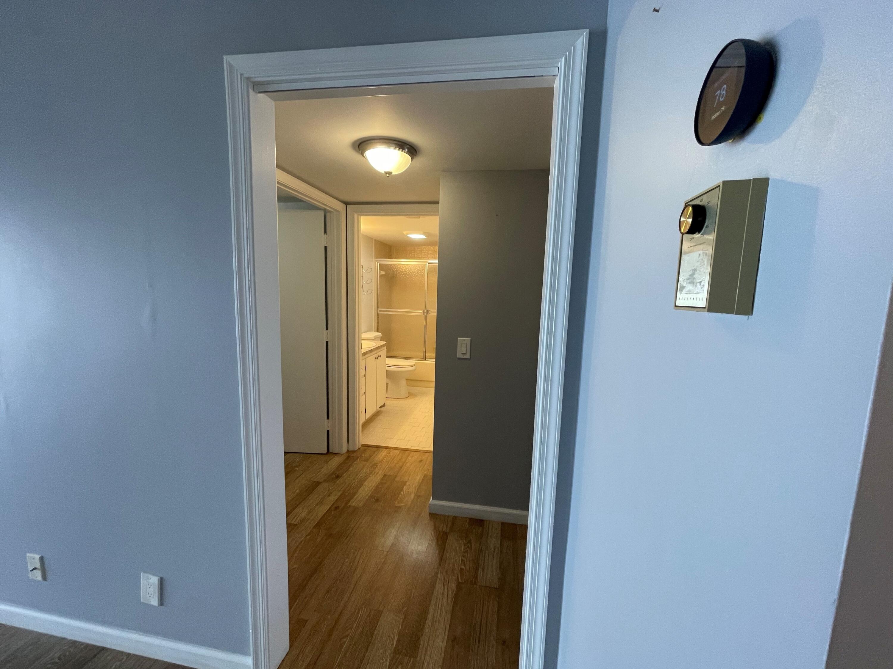 3100 Southeast Pruitt Road, Unit G207 Port St. Lucie, FL 34952 - Photo 14 of 17 Hall to Bedrooms