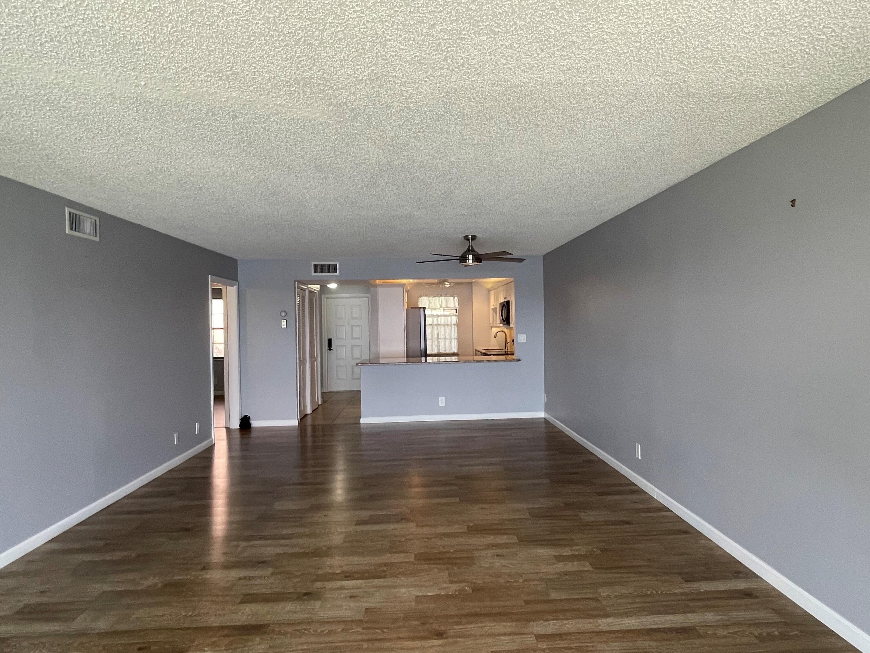 3100 Southeast Pruitt Road, Unit G207 Port St. Lucie, FL 34952 - Photo 2 of 17 Living Room 2