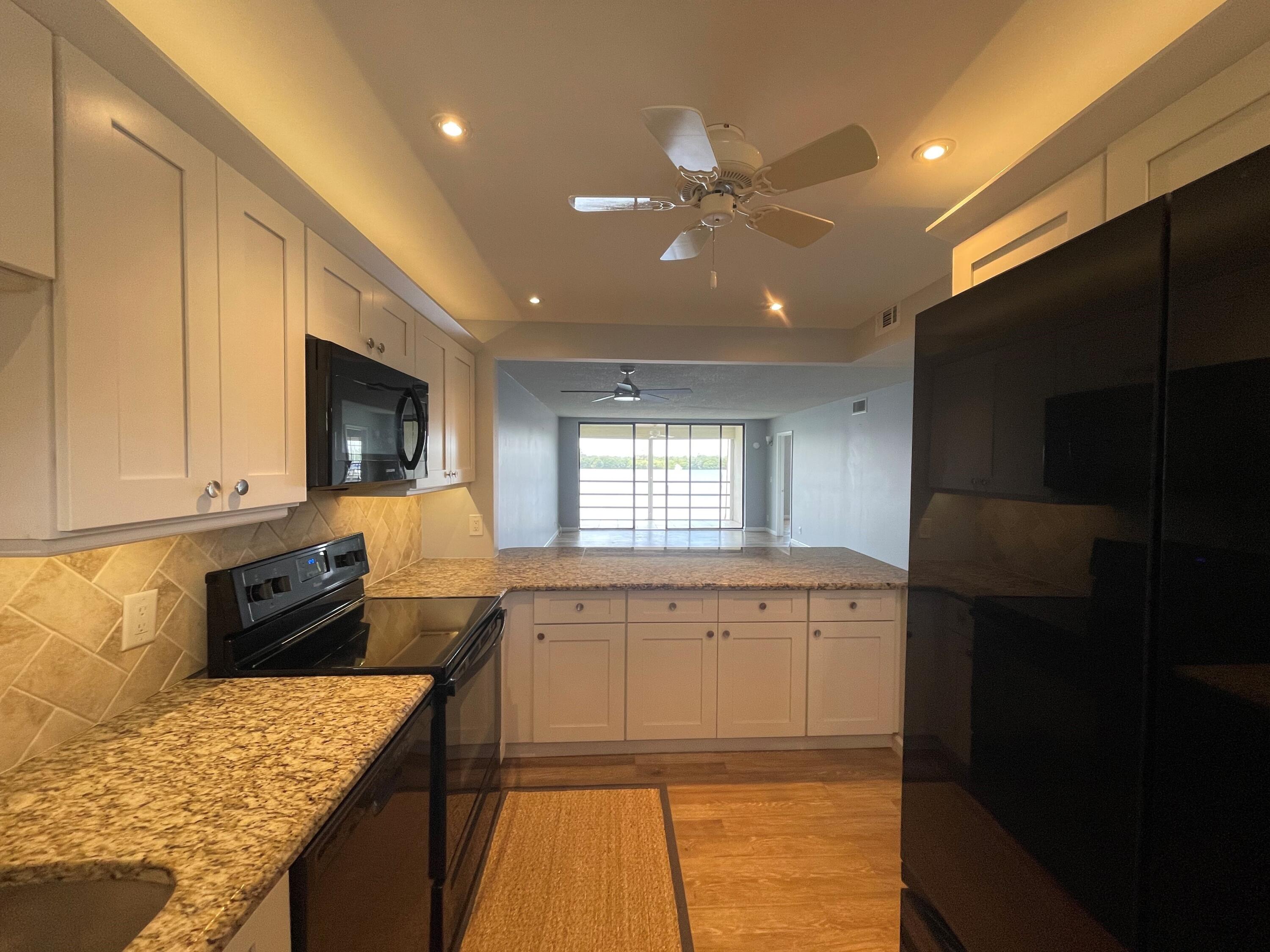 3100 Southeast Pruitt Road, Unit G207 Port St. Lucie, FL 34952 - Photo 7 of 17 Kitchen 2