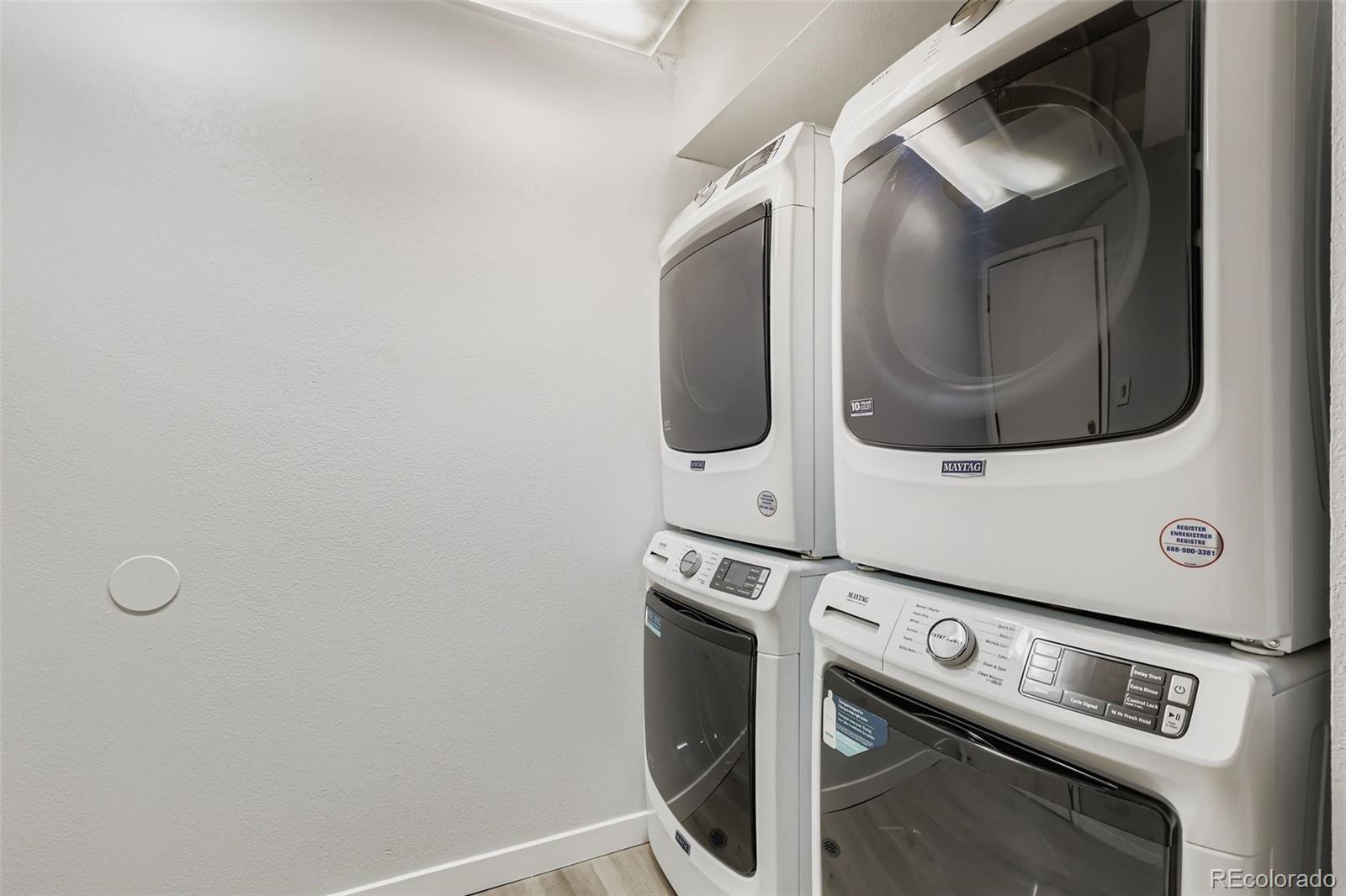 444 17th Street, Unit 404 Denver, CO 80202 - Photo 21 of 37 a utility room with dryer and washer