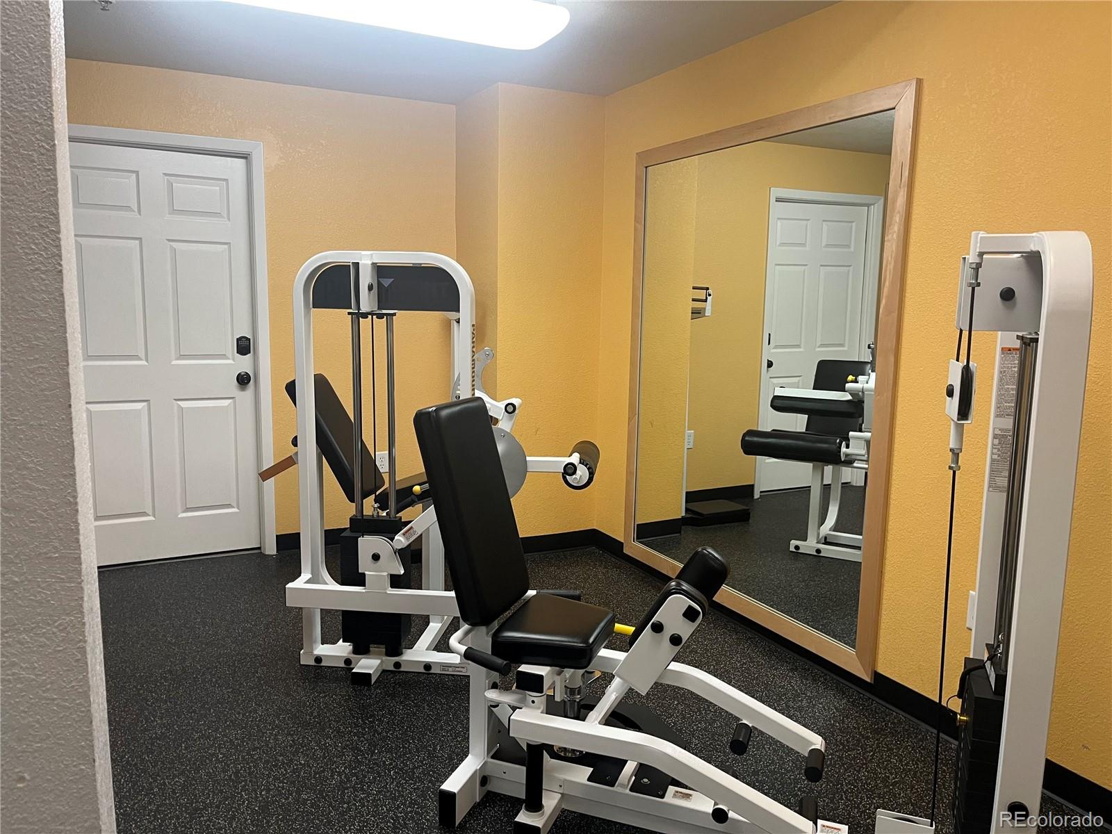 444 17th Street, Unit 404 Denver, CO 80202 - Photo 26 of 37 a view of a room with gym equipment