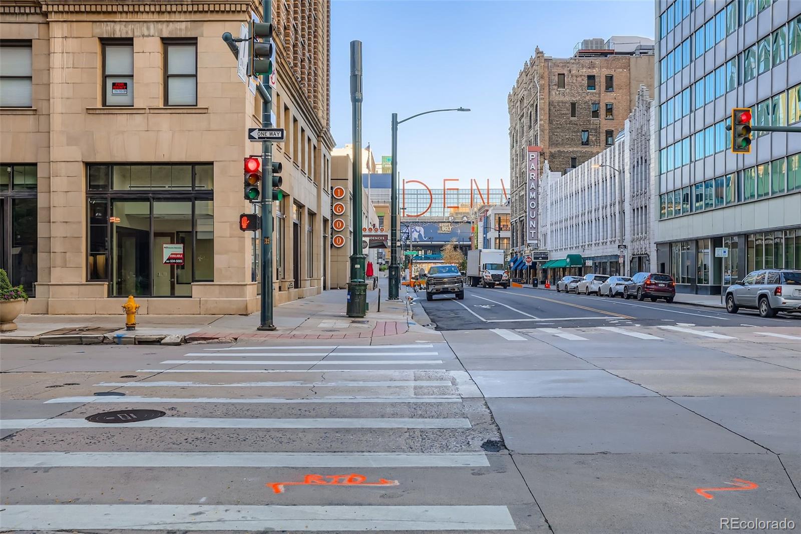 444 17th Street, Unit 404 Denver, CO 80202 - Photo 29 of 37 a city street lined with tall buildings