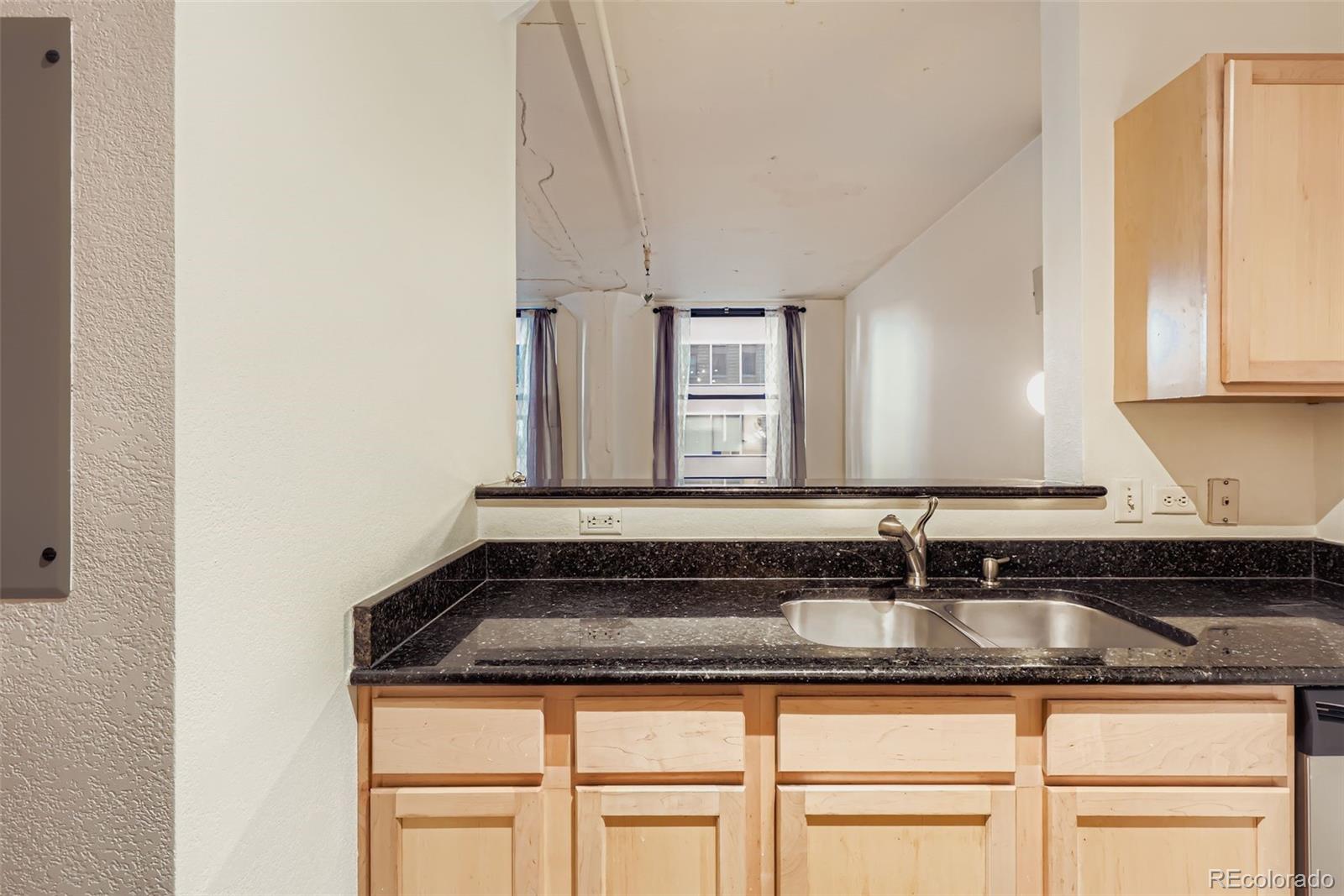 444 17th Street, Unit 404 Denver, CO 80202 - Photo 8 of 37 a close view of sink and tap
