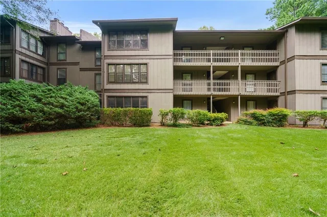 a view of a building with a garden