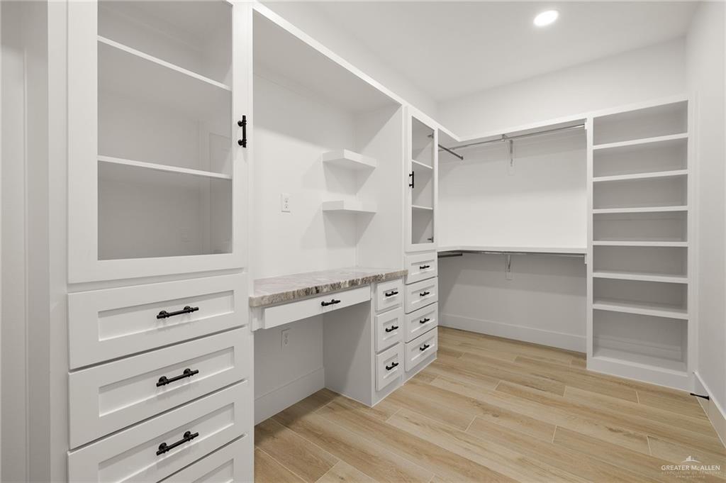 2525 Trinity Avenue McAllen, TX 78504 - Photo 17 of 33 a kitchen with cabinets appliances and a window