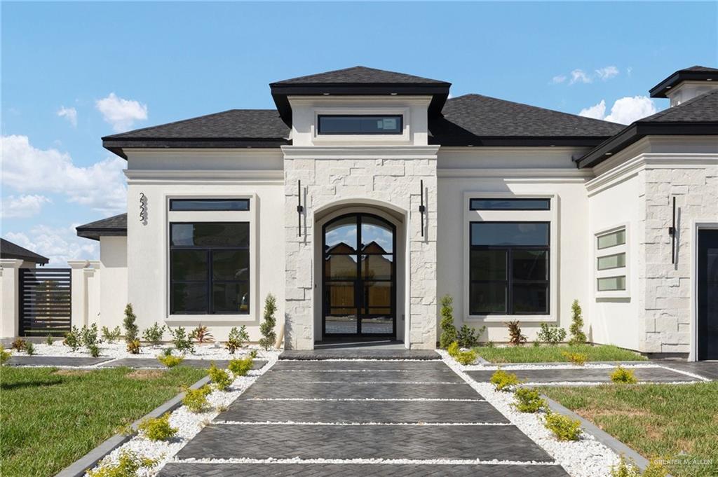 2525 Trinity Avenue McAllen, TX 78504 - Photo 2 of 33 a front view of a house with yard