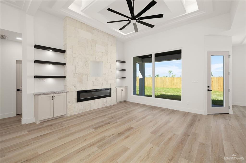 2525 Trinity Avenue McAllen, TX 78504 - Photo 4 of 33 an empty room with wooden floor closet and windows