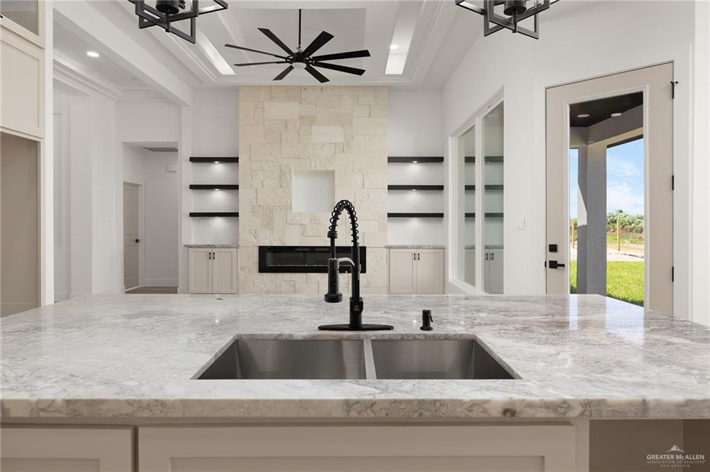 2525 Trinity Avenue McAllen, TX 78504 - Photo 10 of 33 a kitchen with a sink and a window