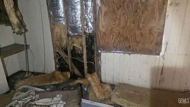 a room with a fireplace and a outdoor view