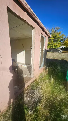 a backyard of a house with seating space